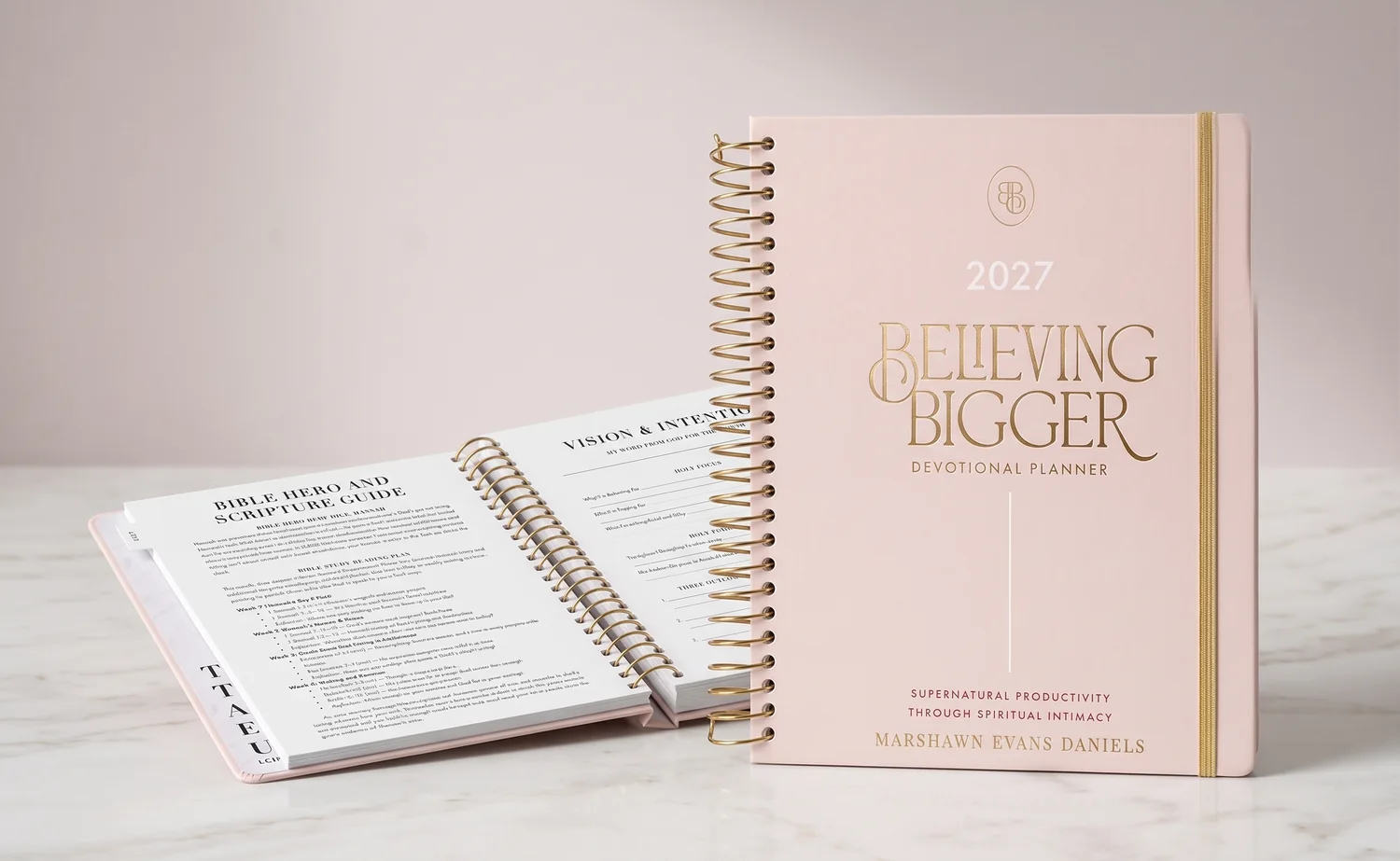 Believing Bigger planner shown standing and lying flat